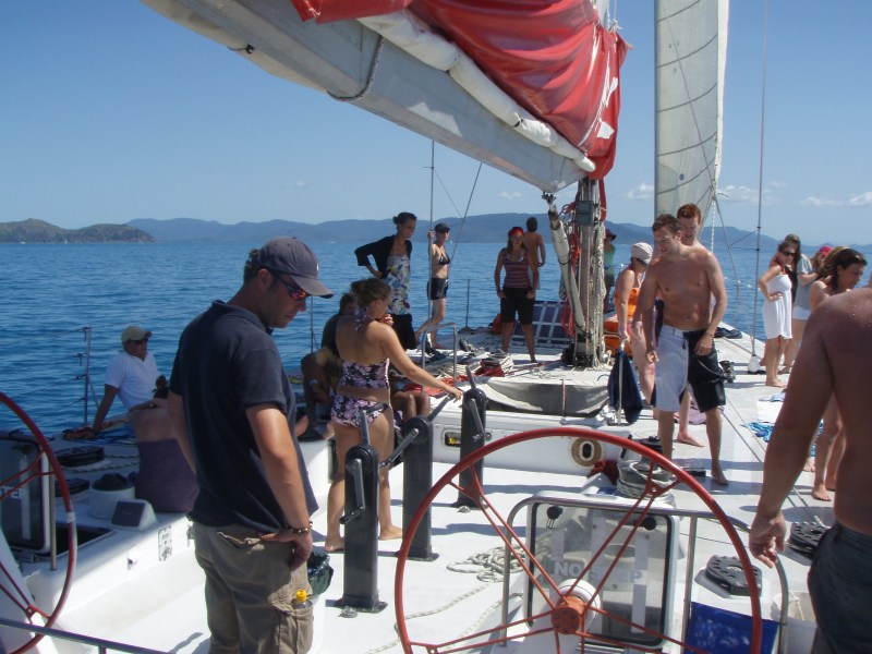 a group of people on a boat in the water