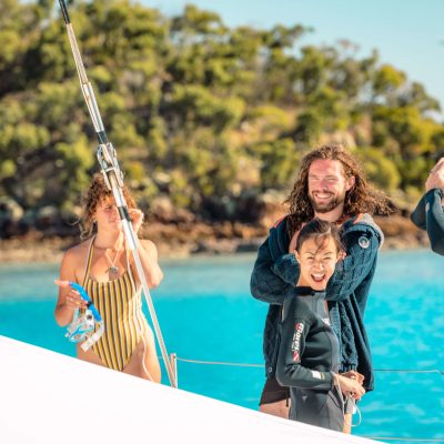 a person standing in front of water