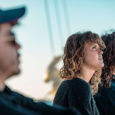 a man and a woman looking at the camera