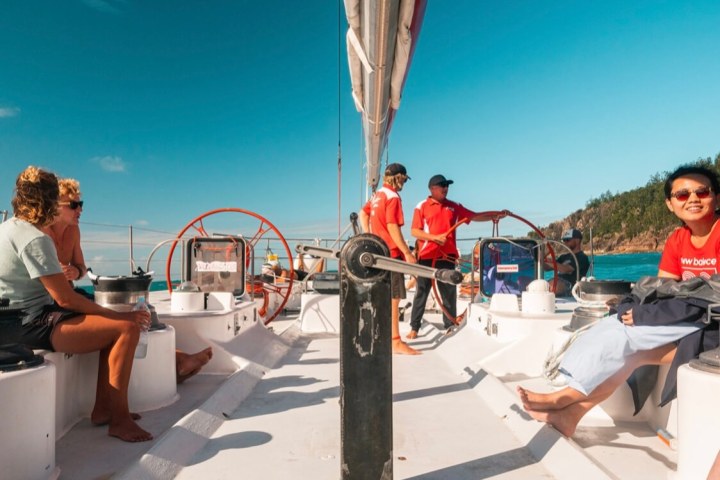 a group of people sitting at a table