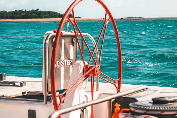a boat sitting on top of a beach