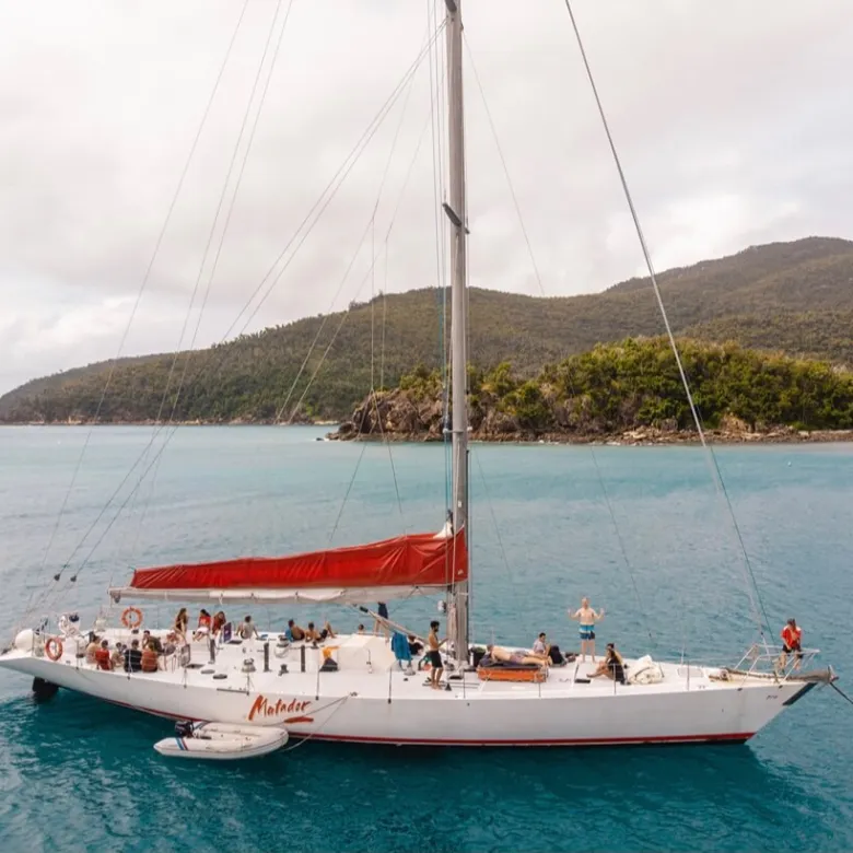 a small boat in a large body of water