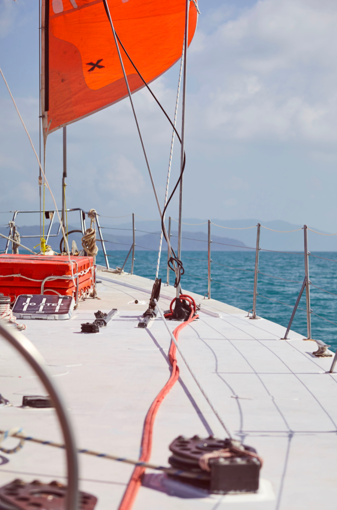 a boat sitting on top of a beach